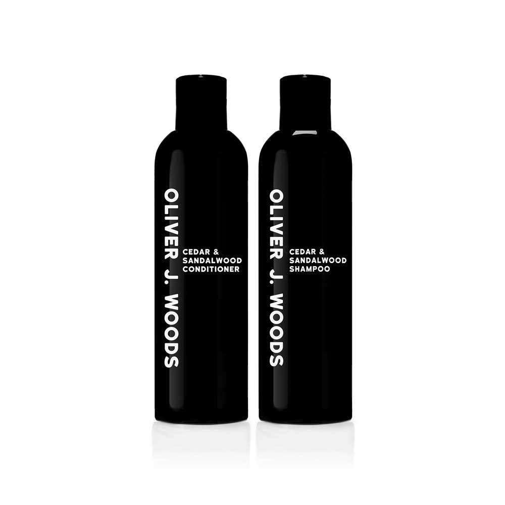 A set of luxury men's grooming products including Cedar & Sandalwood Shampoo and Conditioner